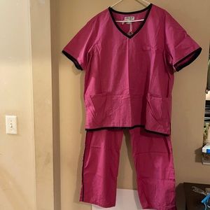 Natural Uniforms, pink trimmed with black.